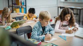 Kids in classroom looking bored | Photo by Tima Miroshnichenko/Pexels