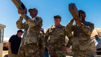 Maj. Gen. Phil Brooks, Fires Center of Excellence and Fort Sill commanding general, center, observes as to students practice disabling UAVs during training at Fort Sill's new Joint Counter-small Unmanned Aircraft Systems (C-sUAS) University (JCU). | U.S. Army/Christopher Wilson